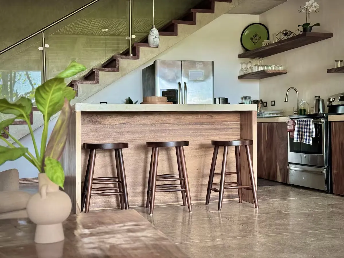 Kitchen bar in tropical hardwood under the stairs