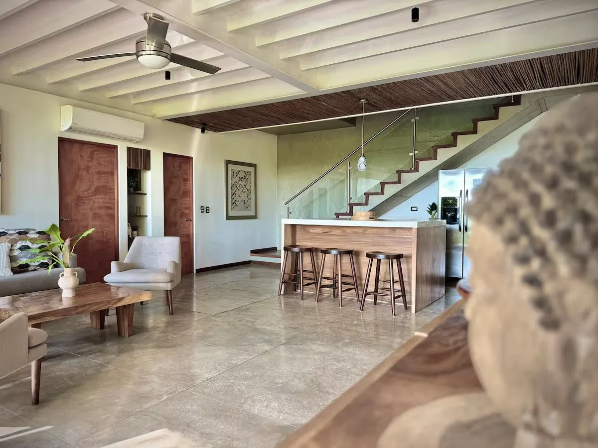 Open-plan ground floor with kitchen and staircase